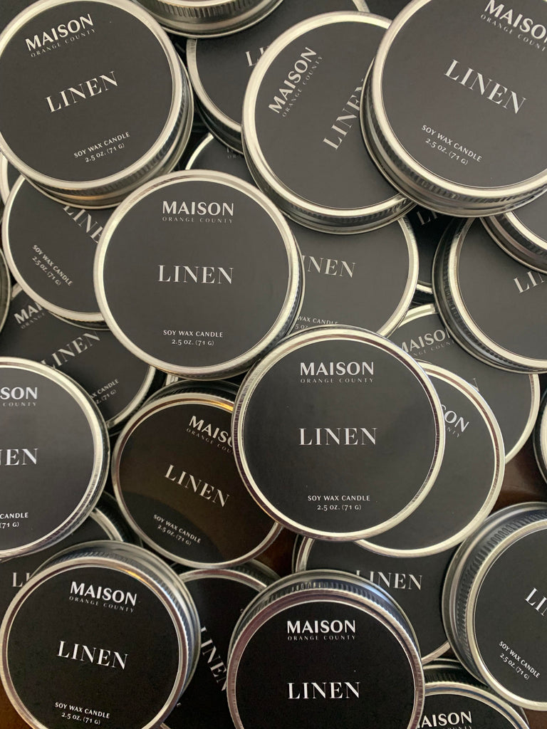 black labels on candle lids for a bulk candle order